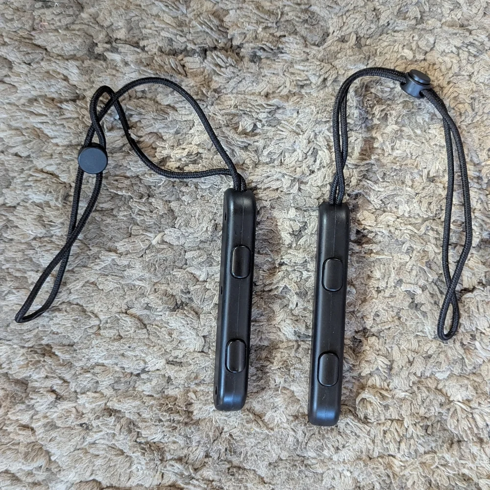 Two Nintendo Switch Joicon Controller Attachments